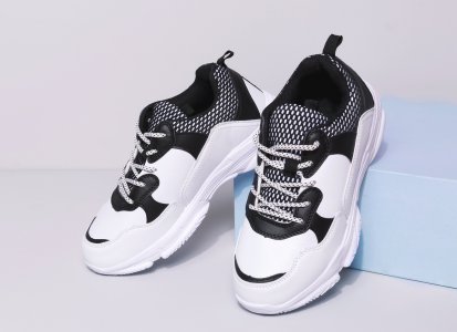 Fashionable black and white sneakers